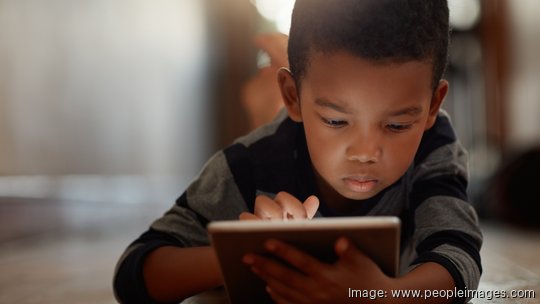 child using a smart device