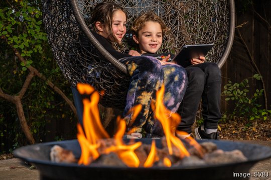 Eva Farzin-Horton, 8, and her brother Ari, 7, use the Betweened app made by Carla Engelbrecht, the CEO and Founder of Betweened, a family-friendly social media app.