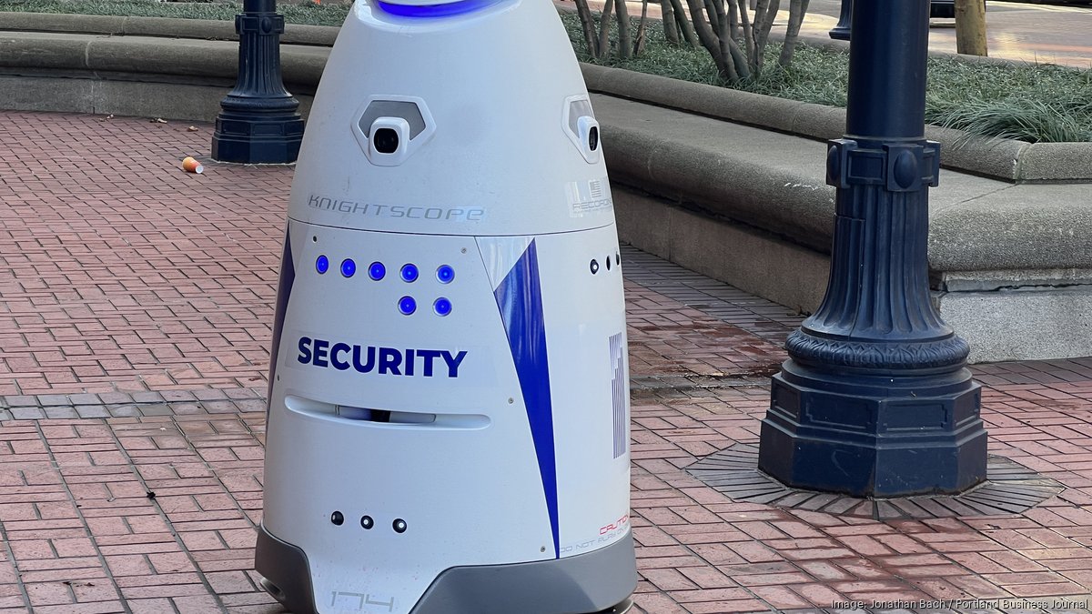 Security robot patrols Big Pink garage in downtown Portland Portland