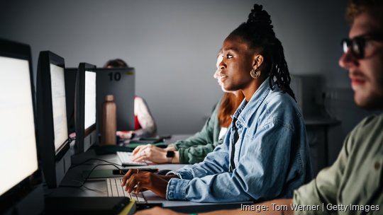 Coders working on computers