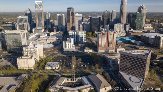 Aerial View of Charlotte, North Carolina on clear day showing highways and skyline