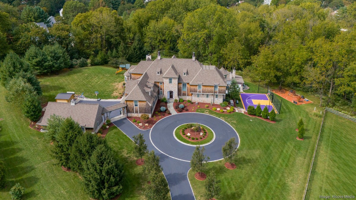 10,000-SF 'resort-like' Malvern estate with basketball court, pool, two