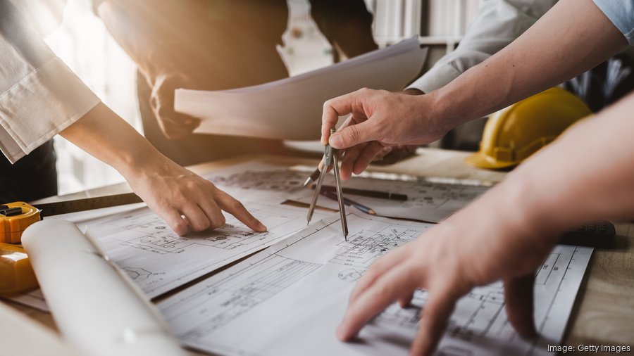 Fourth Elm Construction and Greensboro Developers building nearly spec