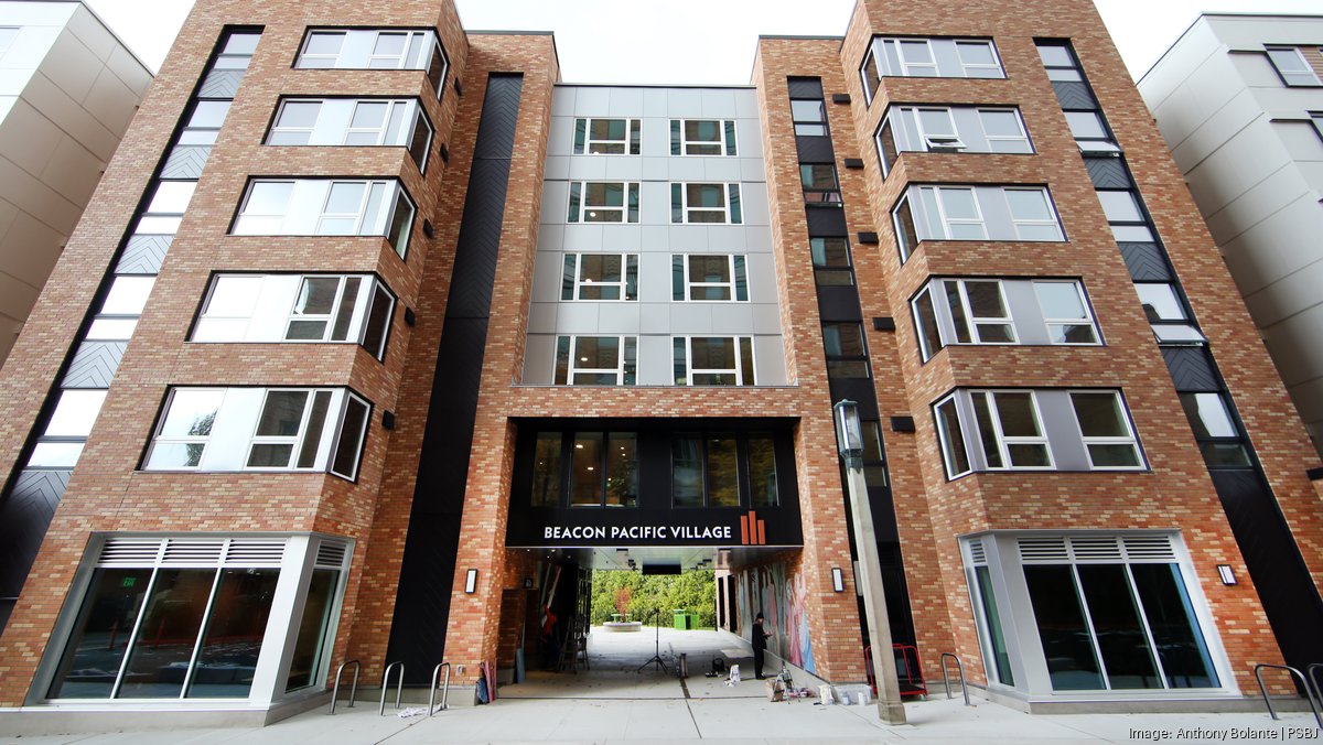 Affordable housing project on former Amazon HQ property hits milestone ...
