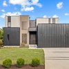 A dentist used a tooth as loose inspiration for his modern McLean home. He just put it on the market so he can build another one.