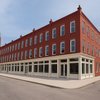 Downtown apartments rise from long-abandoned block