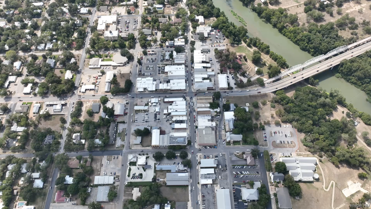 With Bastrop parking structure plan on hold, city instead finds new home for beloved barbershop