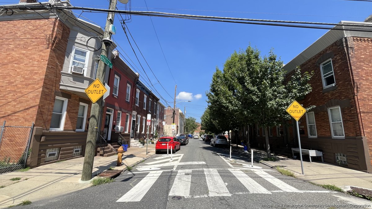Nonprofit buys 14 homes and warehouse on same block to create 'microcosm of a community'
