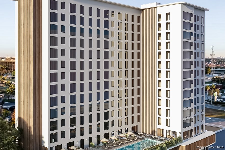 $101M Universal-area tower adds firms as construction advances