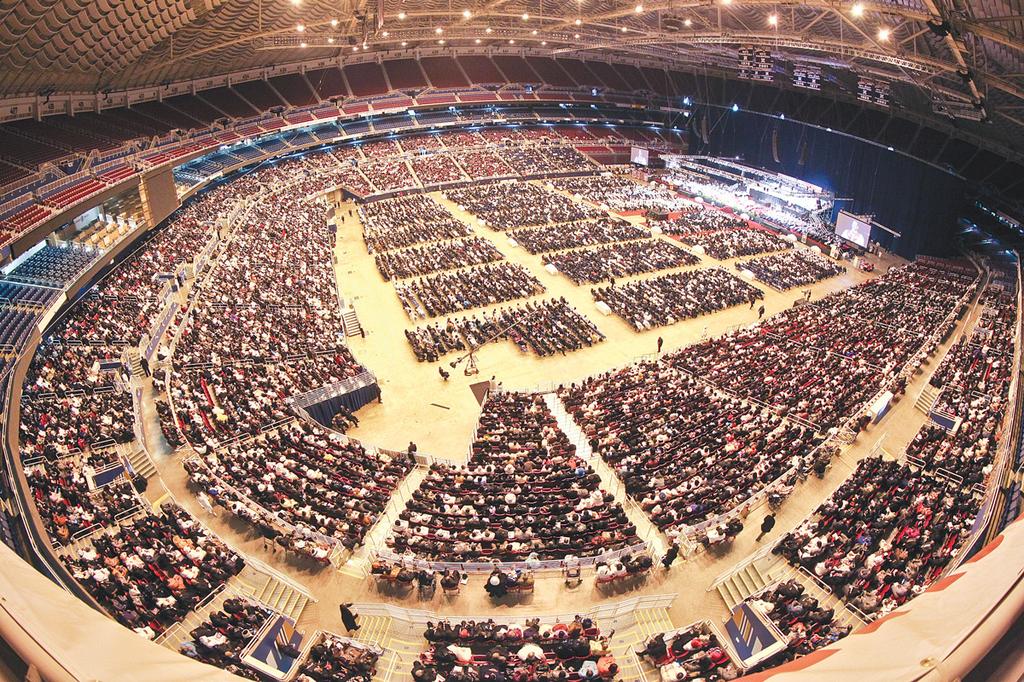 As work on overhead lighting takes place on the floor of the Edward Jones  Dome in St. Louis, The St. Louis Rams Super Bowl Championship banner  continues to hang from the rafters