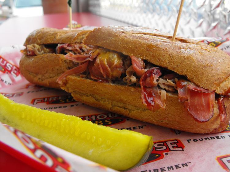 ED MURRIETA Eating hot, meaty sandwiches at Firehouse Subs