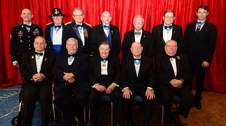 The Atlanta Braves honor seven Congressional Medal of Honor recipients Col.  Donald Ballard, from left to right, Sgt. Gary Beikirch, Maj Gen Pat Brady,  Col. Bruce Crandall, Col. Joe Jackson, Sgt. Maj.