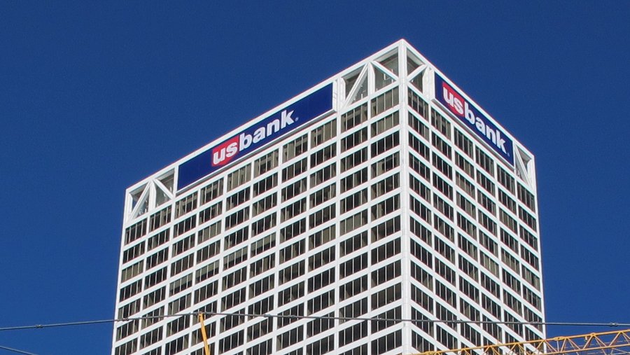 What's the cost of adding 'Baird' signage atop iconic downtown office