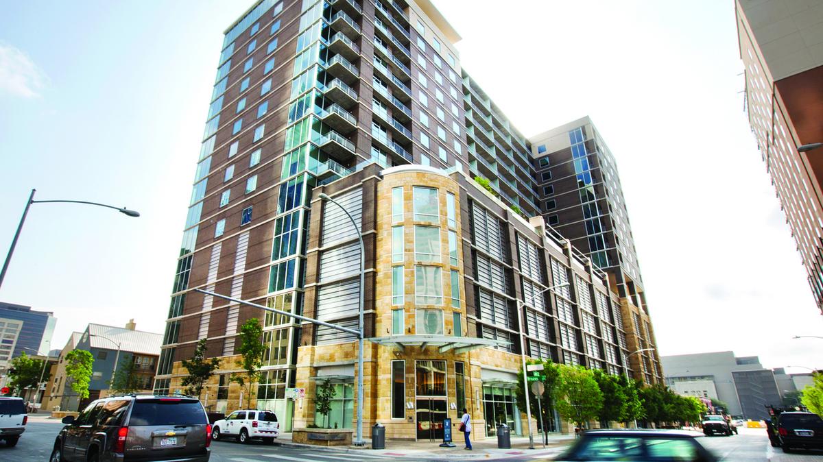 Downtown Austin apartment tower The Whitley for sale - Austin Business