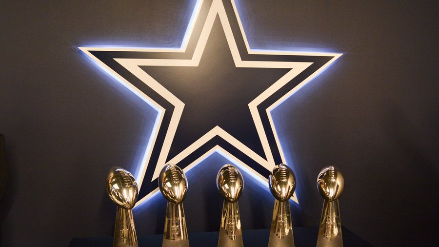 Dallas Cowboys shop hosts fan event with Super Bowl XI trophy