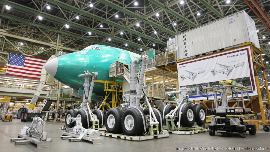 A cargo-carrying configured Boeing 747-8 Freighter jetliner is under construction on the manufacturing floor in Everett, Washington
