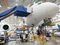 A Boeing 787 jetliner is under construction on the manufacturing floor in Everett, Washington