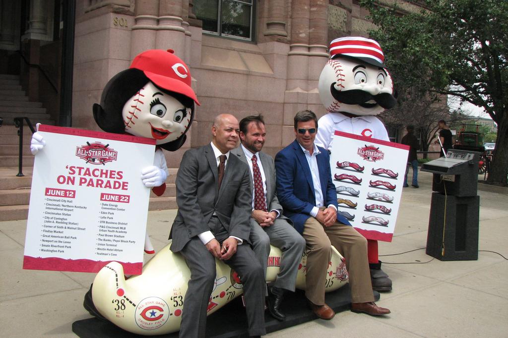 MLB, Cincinnati Reds add massive mustache and hat to Scripps Center -  Cincinnati Business Courier