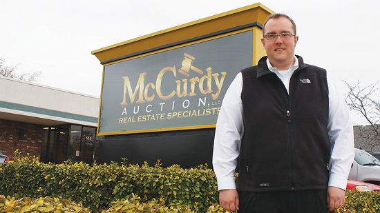 McCurdy Auction rebrands with slightly new name, new logo