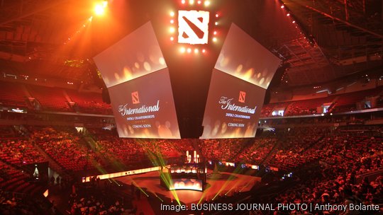 Thousands of fans pack Key Arena at the start of DOTA-2 The International video gaming competition's main event week in Seattle, Washington