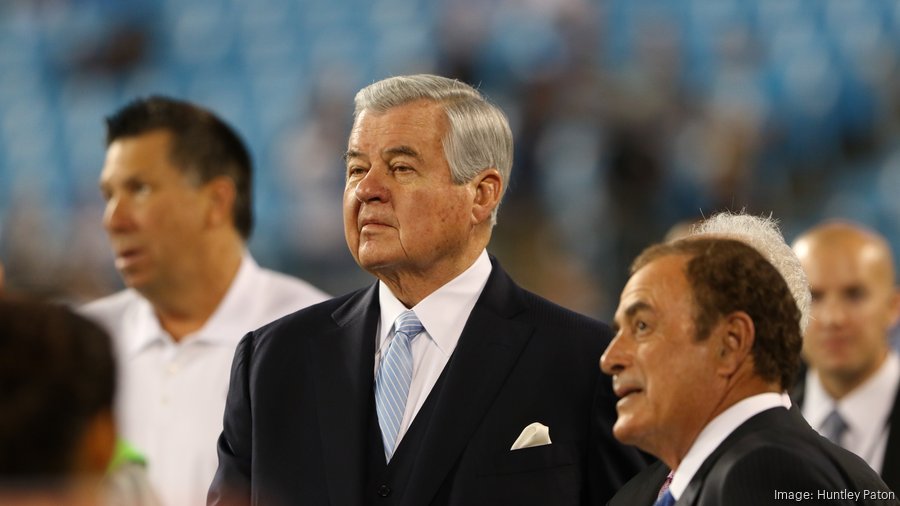 Former Bank of America CEO Hugh McColl, left, Carolina Panthers team owner Jerry  Richardson, center, and head coach John Fox chat during football practice  Thursday, May, 28, 2009, in Charlotte, N.C. (AP