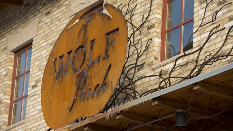 Wolf Peach restaurant to close; building owner Tim Dixon selling ...