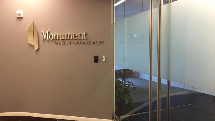 The entrance to the Monument Wealth Management suite on the fourth floor at 1701 Duke St. in Alexandria.