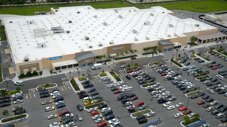The sprawling parking lot of a Walmart Supercenter.