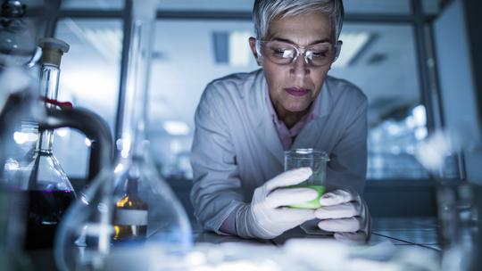 Female scientist working on a new scientific experiment.